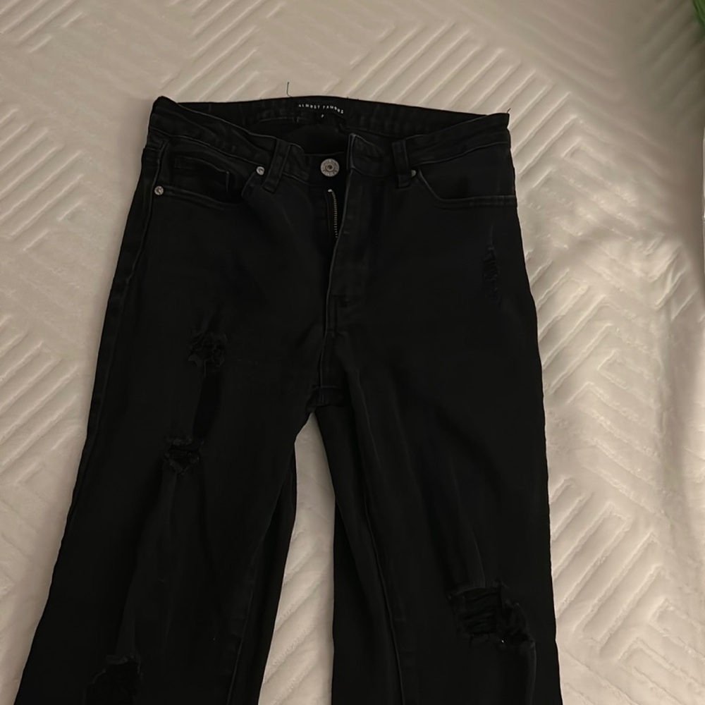 Black flared ripped jeans